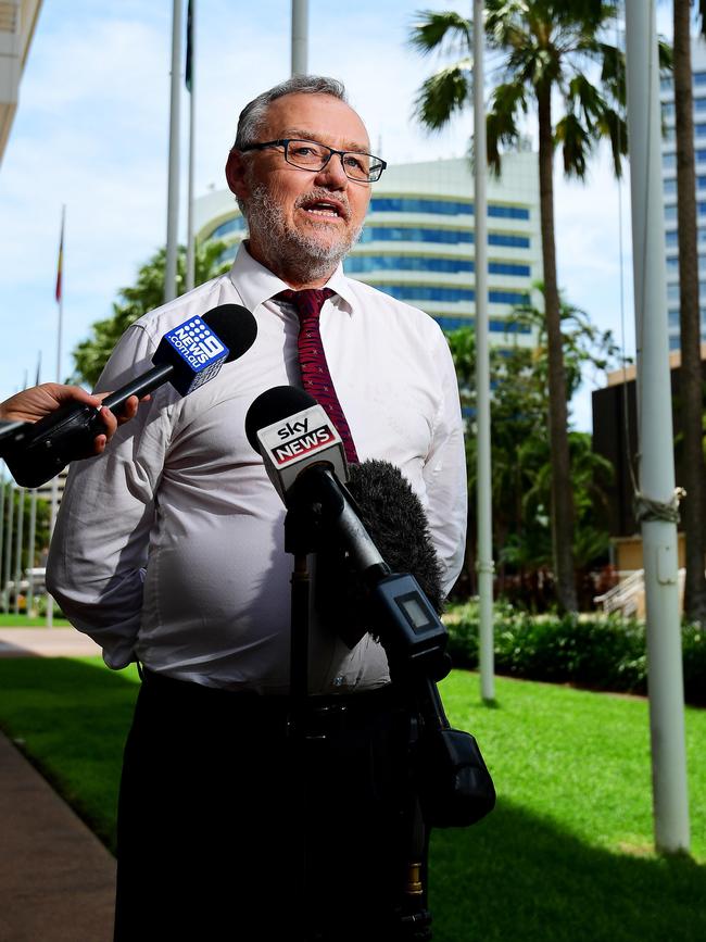 John Lawrence SC speaks to the media about youth justice issues outside Parliament House in 2019.