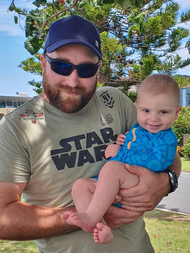 Goulburn local, Aaron Casey with his youngest child, spoke of his hardships of gaining acute care in the region.