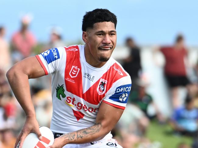 CAIRNS, AUSTRALIA - AUGUST 12: Talatau Amone of the Dragons passes the ball during a round 24 NRL match between South Sydney Rabbitohs and St George Illawarra Dragons at Barlow Park on August 12, 2023 in Cairns, Australia. (Photo by Emily Barker/Getty Images)