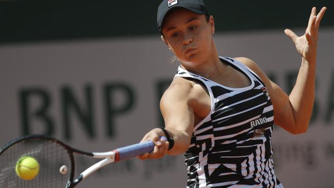 Ash Barty hits a return to Madison Keys during their French Open quarter final clash on Thursday night. Picture: AP