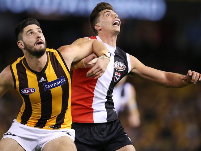 St Kilda’s Lewis Pierce goes up against Hawthorn’s Marc Pittonet. Picture: Michael Klein