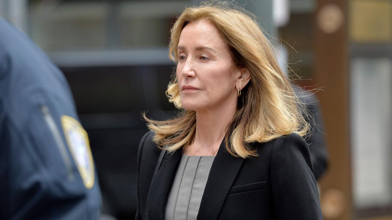 Actress Felicity Huffman is escorted by police into court in the United States Courthouse in Boston, Massachusetts, May 13, 2019. Picture: Joseph Prezioso / AFP.