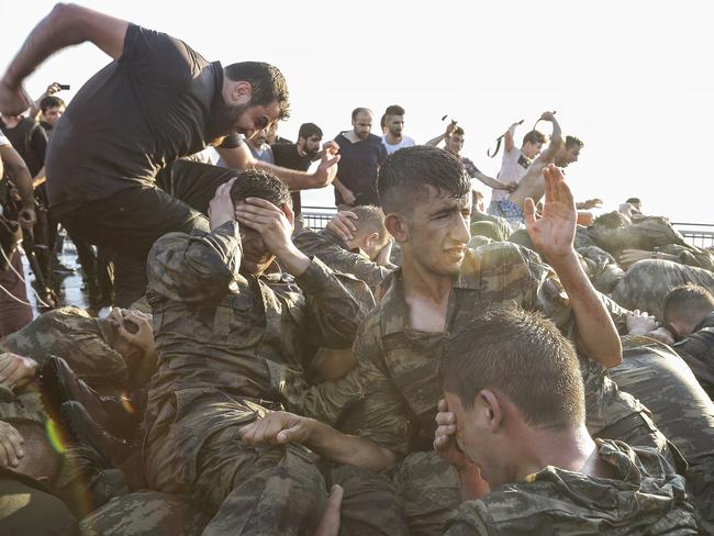 Soldiers involved in the coup attempt surrender on Bosphorus bridge. Picture: Gokhan Tan/Getty Images