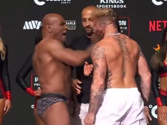 Mike Tyson slaps Jake Paul at the weigh-in. Photo: X.