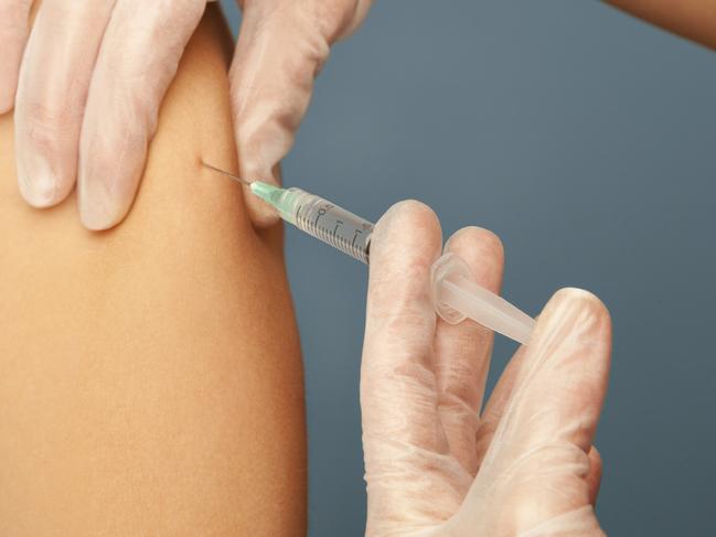 Generic photo of a person getting a flu shot. vaccination / needle / doctor / patient.   Picture: iStock