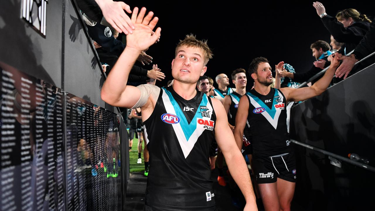 ADELAIDE, AUSTRALIA - APRIL 26: Ollie Wines of the Power celebrates during the round 6 AFL match between Port Adelaide and North Melbourne at Adelaide Oval on April 26, 2019 in Adelaide, Australia. (Photo by Daniel Kalisz/Getty Images)