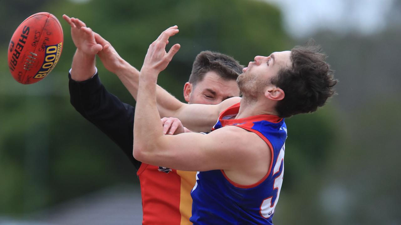 South Barwon’s Jack Driver and St Joseph's’ Cameron Tudor fight for the ball in July. Picture: Mark Wilson