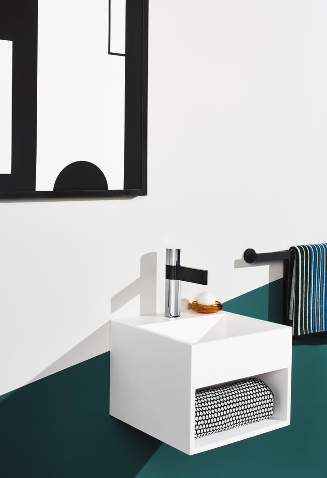 If space is tight, you can still get the above-counter basin look with a wall-mounted basin like the Kado Aspect solid wall basin from Reece.