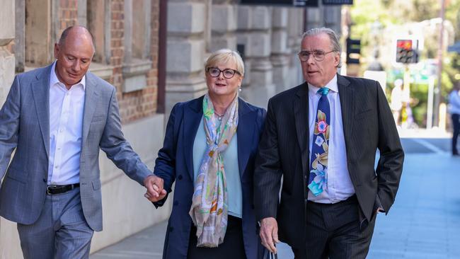 Linda Reynolds, with her husband, left, and lawyer Martin Bennett. Picture: Colin Murty