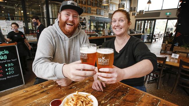 Bright locals Bryan Farrell and Kristi Hacket finally get to have a beer in the bar at the Bright Brewery. Picture: David Caird