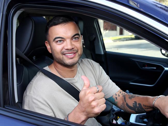 Singer Guy Sebastian pictured leaving his Maroubra house after news broke that his former manager Titus Day was arrested in relation to fraud charges. Picture: Toby Zerna