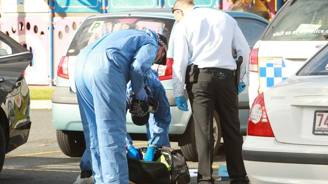 Police at the scene at Helensvale McDonalds yesterday. Photo Mike Batterham