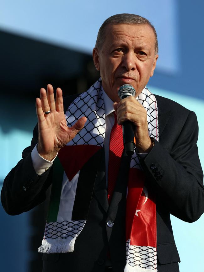 Turkish President Recep Tayyip Erdogan, wearing a scarf with the Palestinian and Turkish flags. Picture: AFP