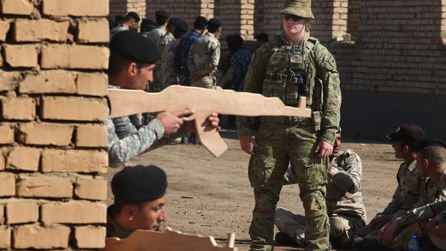 Australian Army Combat Engineer Corporal Teagan Murphy training local forces within Task Group Taji. Picture: Gary Ramage