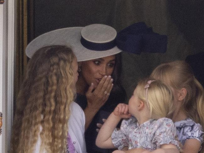 ONE TIME WEB USE FOR NEWS.COM.AU STORY ONLY - FEES APPLY 75GBP PER PIC ONLINE - PRINT FEES ARE 150GBP PER PIC - MUST LET AGENCY KNOW USAGE -  Meghan Markle with Savannah Phillips and Mia Tindall in the  Major General's office overlooking The Trooping of the Colour on Horse Guards Parade.  Picture: Kelvin Bruce/Goffphotos