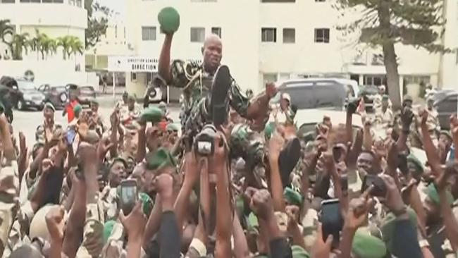 A video grab taken from Gabon on August 2023 shows Gabonese soldiers carrying General Brice Oligui Nguema. Picture: Gabon 24 / AFP