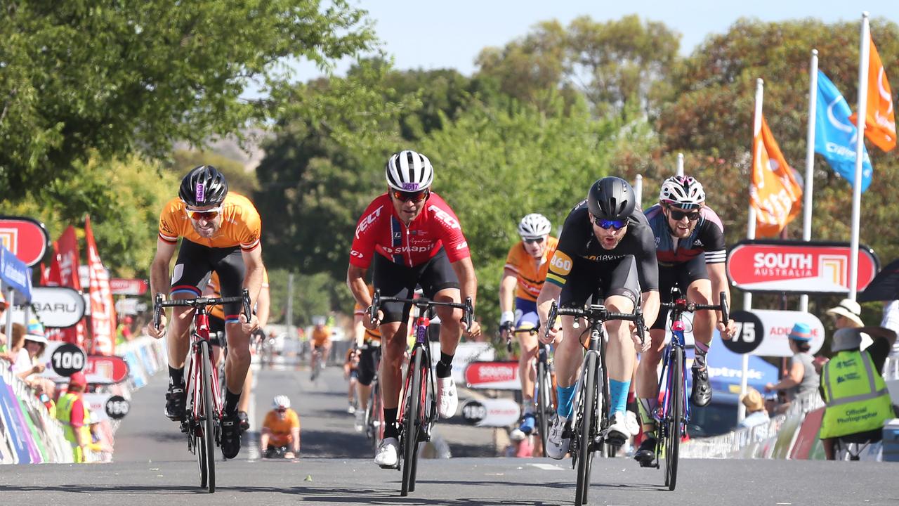 James Page from Melbourne (in black), was the winner of the riders that did the whole trip from Glenelg. (AAP Image/Dean Martin)