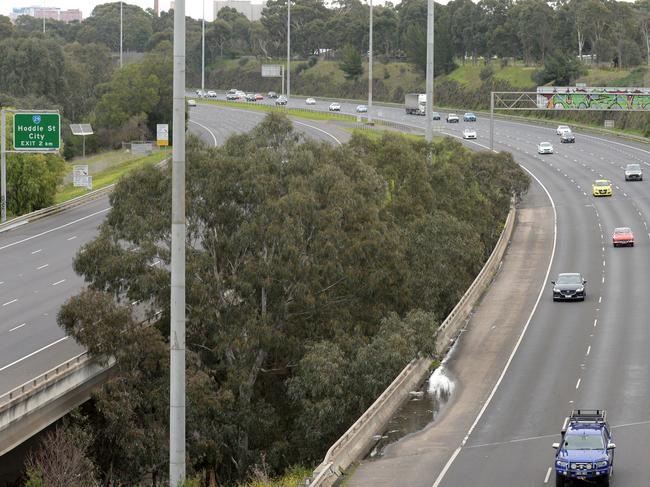 An unknown object was dropped from a bridge onto the Eastern Freeway. Picture: Andrew Henshaw