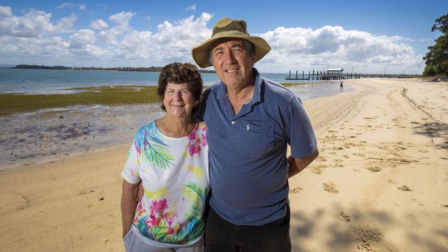 ‘I’m so disgusted with the whole thing, i don’t know who to vote for’... Sandra and John Belleri enjoy a Bribie beach stroll. Photo: Glenn Hunt