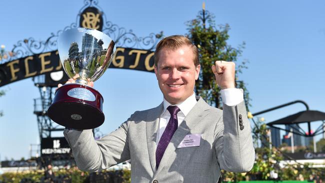 Edward Cummings celebrates Duais’ victory in the 2022 Australian Cup at Flemington. Photo: Reg Ryan / Racing Photos