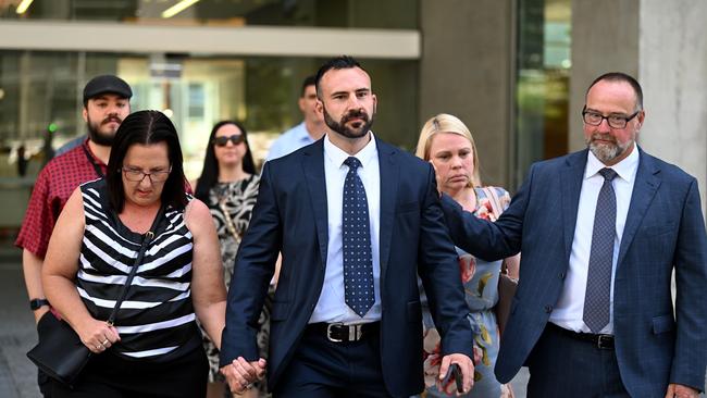 Family of Loris and Franco Puglia, including their son James (centre), stared down the couple’s killer at Brisbane Supreme Court on Tuesday. Picture: NCA NewsWire