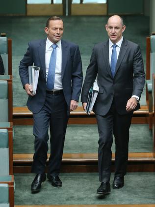 Tony Abbott with Stuart Robert in parliament.