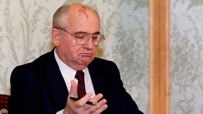 Mikhail Gorbachev reads his resignation statement shortly before appearing on television in Moscow, to announce his decision to the nation on December 25, 1991. Picture: AFP.