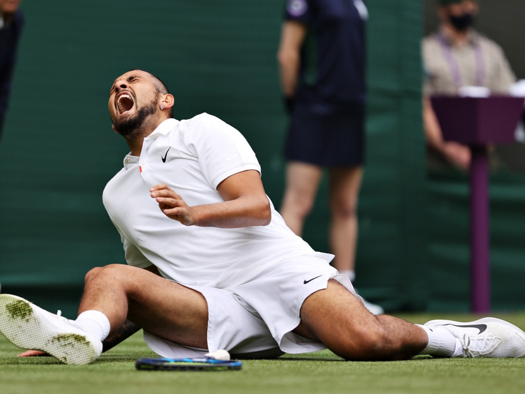 Nick Kyrgios of Australia reacts as he slips over in his Men's Singles First Round match against Ugo Humbert of France during Day Three of The Championships - Wimbledon 2021 at All England Lawn Tennis and Croquet Club on June 30, 2021 in London, England. Photo by Clive Brunskill/Getty Images