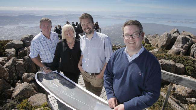 From left, Premier Will Hodgman, Mt Wellington Cableway Company chairwoman Jude Franks, cable car proponent Adrian Bold, and then state growth minister Matthew Groom at the pinnacle last February. Picture: MATT THOMPSON