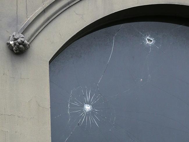 Bullet holes were visible on the window of Boutique Nightclub last week. Picture: Tim Carrafa