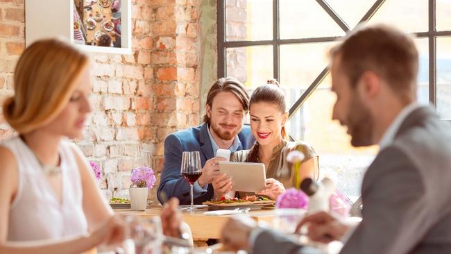 Look at that smug couple, laughing and chatting, thinking they have something over the silent couple. Just you wait. (Pic: iStock)