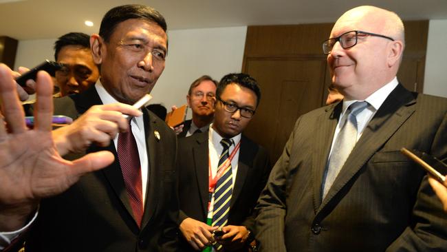 Indonesia’s security minister Wiranto and Australian Attorney-General George Brandis at the counter-terrorism meeting at the weekend.