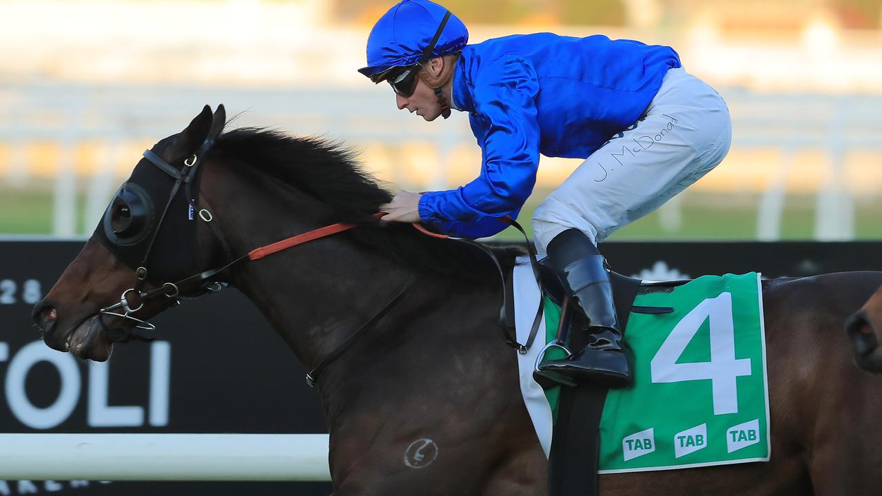 SYDNEY, AUSTRALIA - SEPTEMBER 28: James McDonald on Ranier (blue) on their way to winning race 9 the Sydneyâ€™s West Handicap during the Golden Rose Day Sydney Racing at Rosehill Gardens on September 28, 2019 in Sydney, Australia. (Photo by Mark Evans/Getty Images)