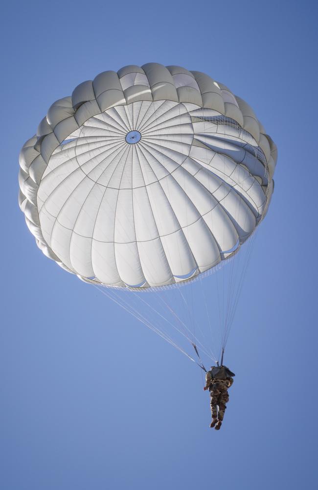 A US Army special forces soldier in Sydney after exiting a US Air Force MC-130J Commando aircraft as part of static-line parachuting training activity in the lead up to Exercise Talisman Sabre 2023. Picture: Cpl Cameron Pegg/US Army