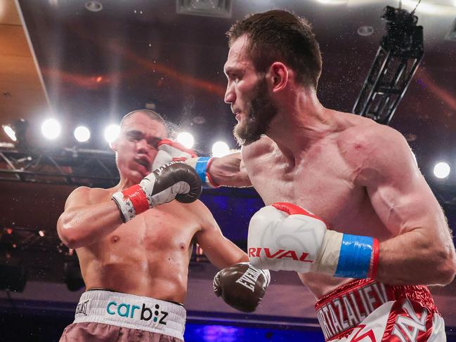 ORLANDO, FLORIDA - OCTOBER 19: Bakhram Murtazaliev punches Tim Tszyu at Caribe Royale Orlando on October 19, 2024 in Orlando, Florida.   Alex Menendez/Getty Images/AFP (Photo by Alex Menendez / GETTY IMAGES NORTH AMERICA / Getty Images via AFP)