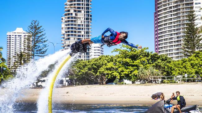 Petar Krstic from Gold Coast Water Sports on a flyboard at Pelican Beach. Picture: Nigel Hallett