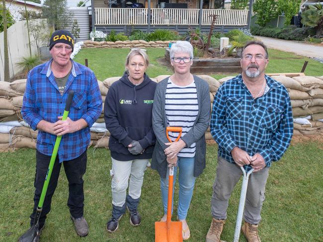 Myles BoalJane BoalValerie Myers Ronnie MyersAll live on Moama St, Echuca Echuca prepares for the impending floods from both the Murray River and the Campaspe River. Authorities have started building a Levy and also lifting an existing levy, cutting some parts of the community off. Picture: Jason Edwards