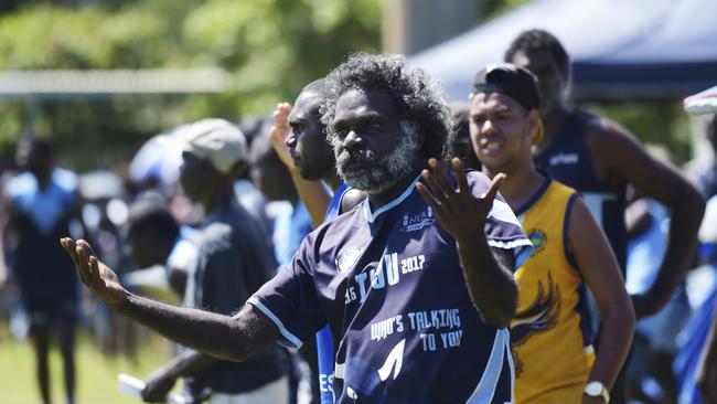 Tuyu Buffaloes fan gestures to Tikilaru Dockers fans. Picture: Keri Megelus