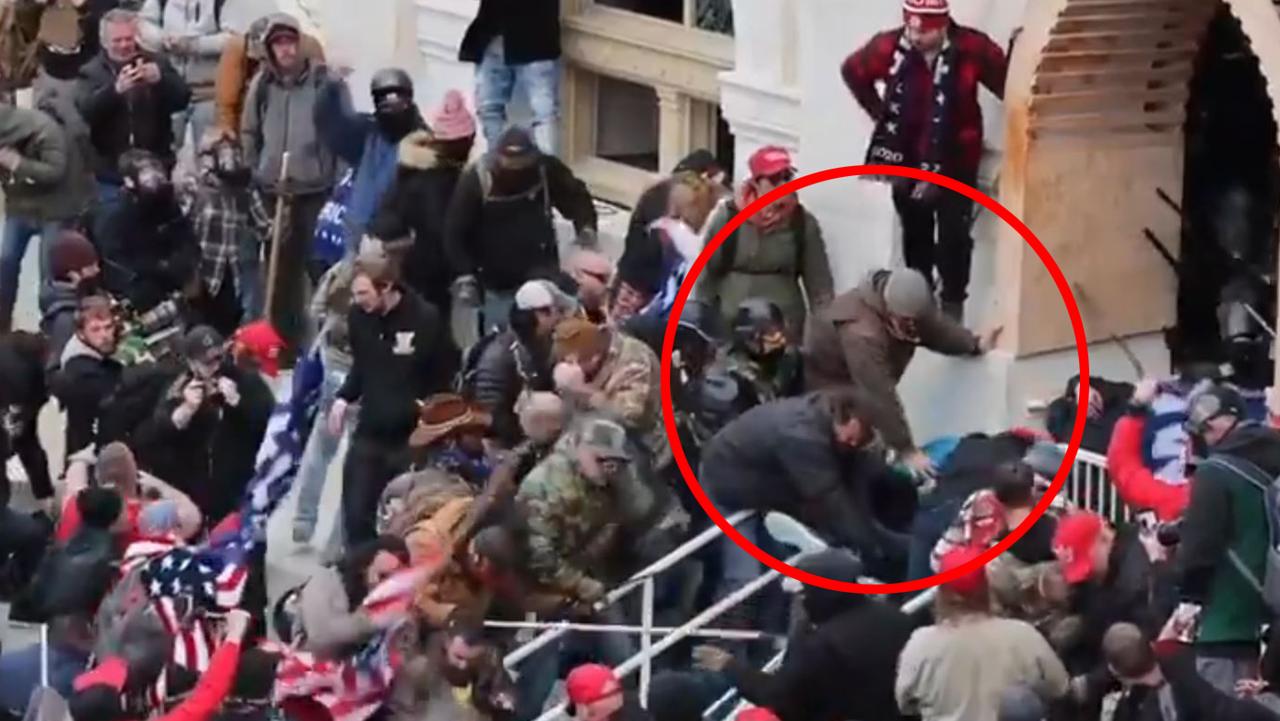 US Capitol riot: Police bludgeoned with flags by pro-Trump mob | Video