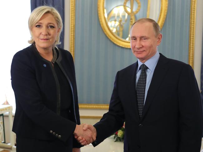 French presidential election candidate for the far-right Front National party Marine Le Pen greets Russian President Vladimir Putin at the Kremlin in Moscow earlier this year. Picture: Sputnik/Mikhail Klimentyev.