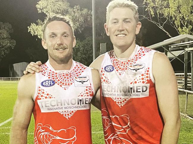 Ryan Smith and teammate Adam Parry after Katherine Souths' 33-point win over the Northern Warlpiri Swans in the preliminary final.