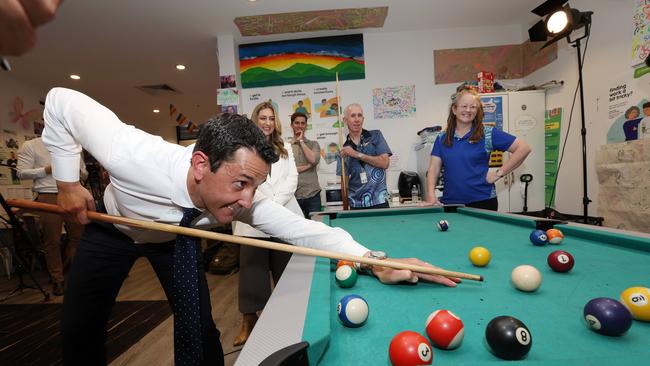 Queensland Opposition Leader David Crisafulli playing pool during a visit to Stockland Rockhampton Shopping Centre. Picture: Liam Kidston