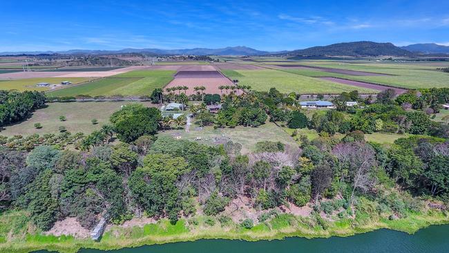 The home is nestled off the Pioneer River.