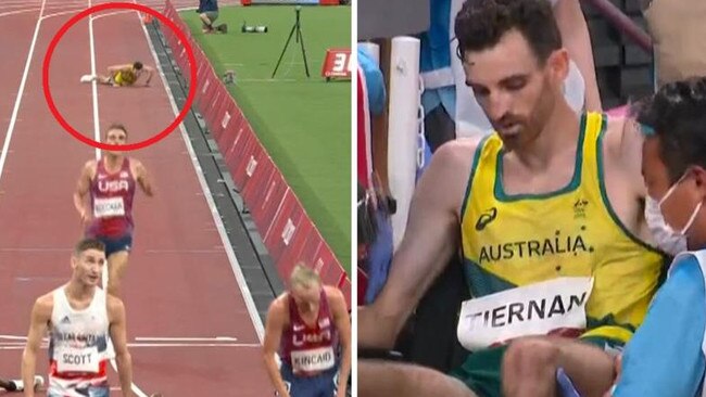 Patrick Tiernan is helped by officials into a wheelchair after he collapsed in the Men’s 10,000m final