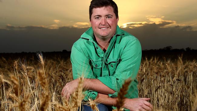 Wade Dabinett in a wheat field at the family farm in Parilla. Picture Simon Cross