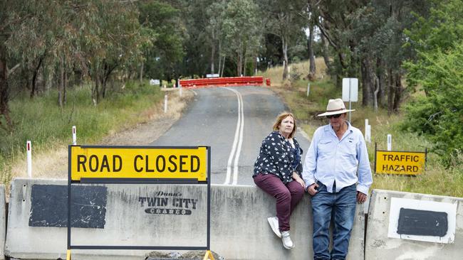 Gemma Toohey and Rick Taylor from The Watchbox winery on the Indigo Creek Road which has been closed due to recent flooding. Picture: Zoe Phillips