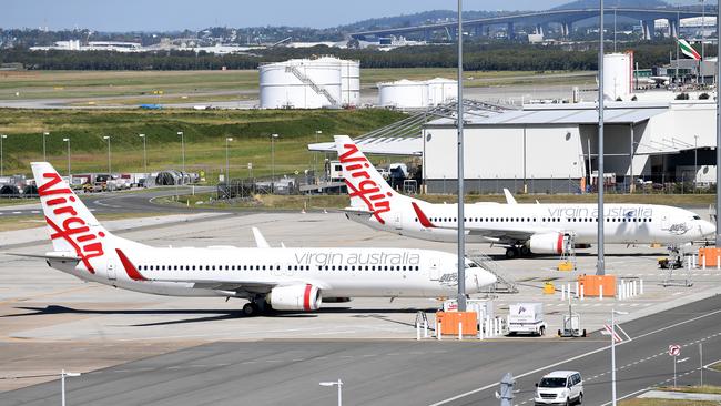 Virgin Australia has more than 60 planes parked at airports around the country, including in Brisbane. Picture: AAP