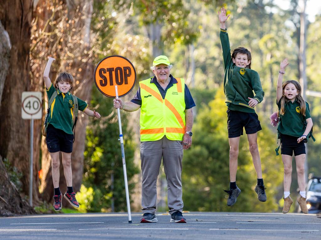 Mr Goulden at the crossing near Mt Dandenong Primary School with students Brandon, 11, Ricky 13 and Sienna 8. Picture: Jason Edwards