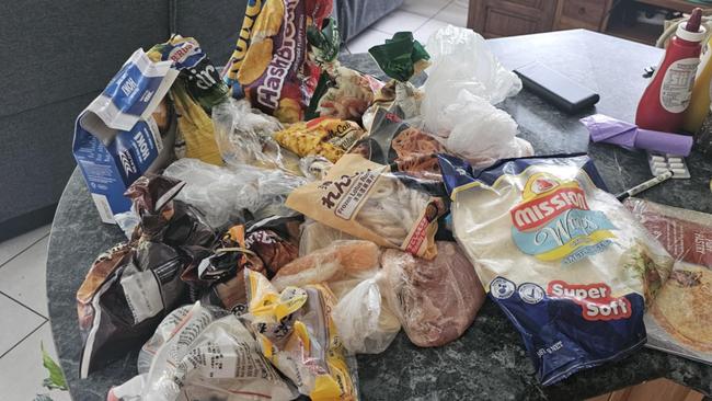 After the power went out for more than a week in some places, Gold Coast residents were forced to dispose of thousands of dollars of groceries. Picture: Tyran Holmes.