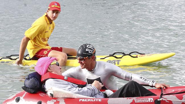 Kevin Ferguson and quadriplegic Sid James competing in the Victor Harbor Ironman.